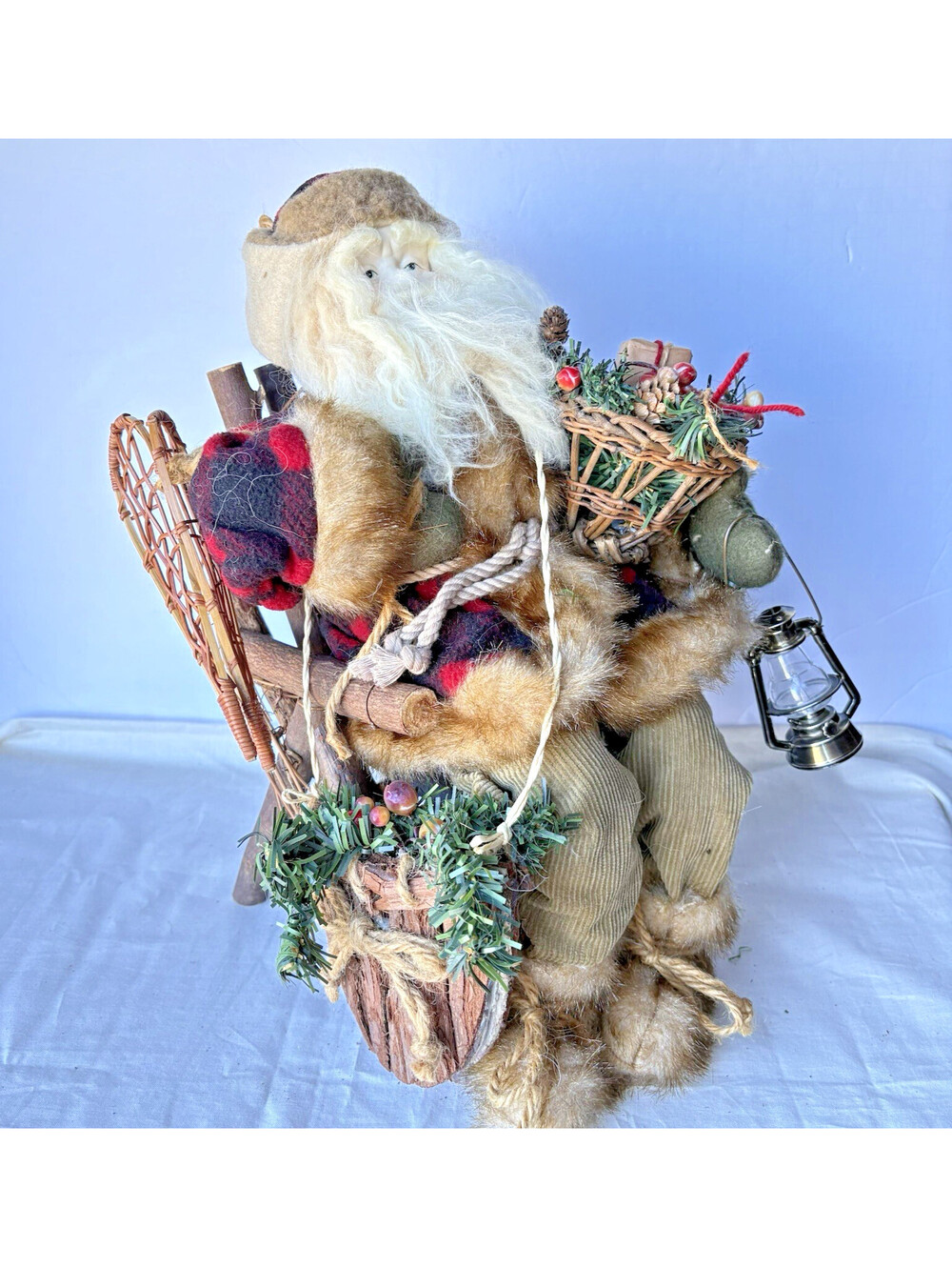 Rustic Woodland Santa Claus sitting on a Wood Twig Chair w/snowshoes & Baskets